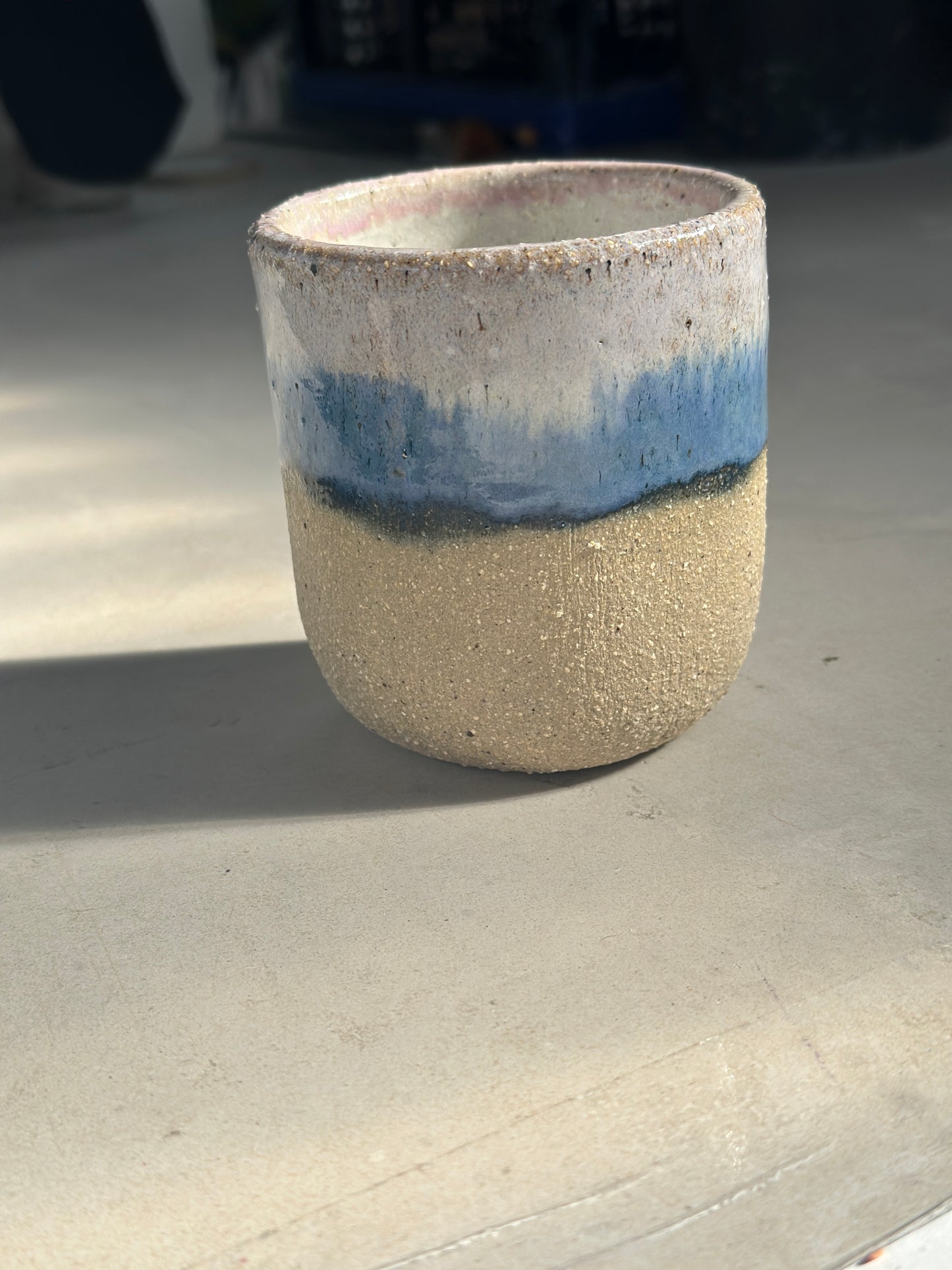 Pink, blue ceramic mug